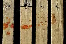 Red betel quid spit on a bridge in Mandalay