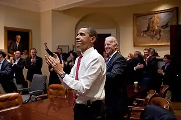 The President and White House staff react to the House of Representatives passing the bill on March 21, 2010.