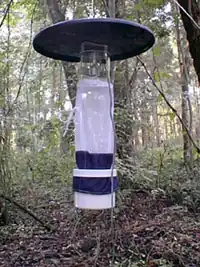 A carbon dioxide-baited CDC light trap at NPSmonitoring site: The highest individual light trap total for 2010 was from a trap located in a salt marsh in the Fire Island National Seashore: around 25,142 mosquitoes were collected during a 16-hour period on August 31.[91]