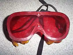 Dark adaptor goggles are used by observers to preserve their natural night vision.