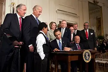 President Obama signs the Patient Protection and Affordable Care Act on March 23, 2010.]]