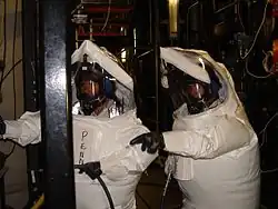 Maintenance workers in DPE suits at the Newport Chemical Agent Disposal Facility.