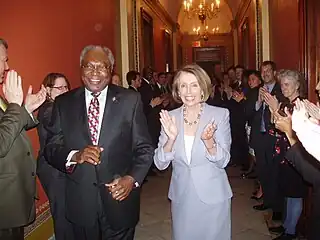 Jim Clyburn and Nancy Pelosi celebrate after the House passes the amended bill on March 21.