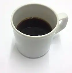 Image of a cup containing black coffee