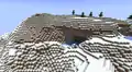 A mountain with a noodle cave opening above y 130