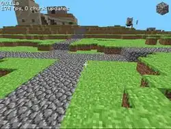 A road towards some buildings.