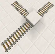 Before placing the top block.