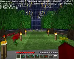 The greenhouse, with trees.