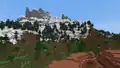 A mountains generated right next to a badlands biome in Bedrock Edition.