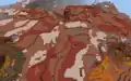 A badlands biome beyond X/Z ±8,388,608, with noticeably distorted terracotta strata.