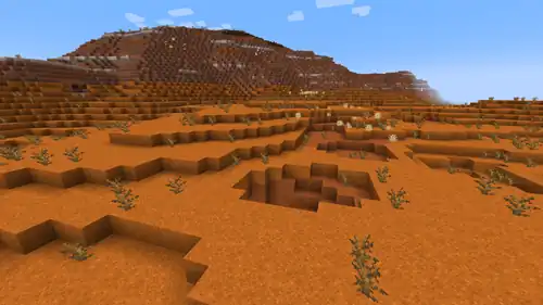 Naturally generated red sand in a badlands biome.
