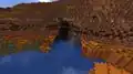 A river cave entrance in a badlands biome.