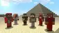 Various African and Middle-Eastern characters by a pyramid in the desert