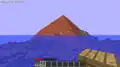 A brick pyramid in the ocean.