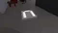 A "U" letter laying on the floor