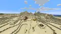 A ruined portal that generated in an abandoned desert village.