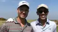 Carl Manneh and Barack Obama playing golf.