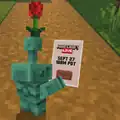 Copper Golem reading the inivtation that says "Minecraft LIVE Sept. 27 10AM PDT"