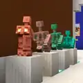 Copper Golem Statues displayed on pillars.