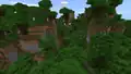 A dark forest hills in Bedrock Edition.
