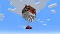 Happy ghast leashed to a boat with a mob