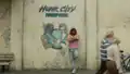 Graffiti of the game's logo and characters outside Game Over World.