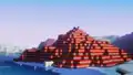 Kai and Zuri on top of a large pile of TNT, from Minecraft x Marketplace Pass.