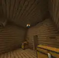 A lantern inside a house that was made by a player.