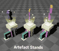 Three stands holding hovering objects.