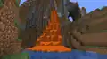 Lava pouring from a cliff.