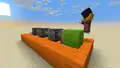 "Makena tinkering with a Redstone contraption made up of Pistons pushing a Lime Wool block."[9]