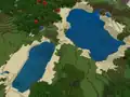 Two large lakes in a plains biome, near a forest biome and a dark forest biome.