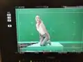 Melissa on a green screen.