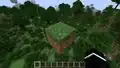A grass block floating in midair.