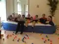 The Mojang support team hanging out in the ball pit.[60]