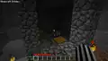 A dungeon found with floor at Y=34 in this version. Its spawner is set up to spawn spiders, as can be seen by the glowing red eyes of the spider model that spins inside of the spawner block.