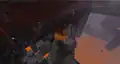 Ari spying on a fortress using a spyglass.