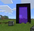 An old stonecutter next to a Nether portal.