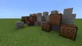 Redstone linked to note blocks, playing a simple melody when the button is pressed.