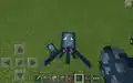 A squid compared to a baby squid in Bedrock Edition.