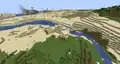 Desert pyramid reaching into 3 biomes (river, desert and plains).