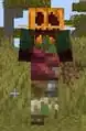 A savanna zombie villager wearing a carved pumpkin.