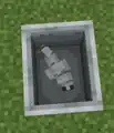 A silverfish riding a minecart.