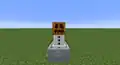 A snow golem riding in a minecart.