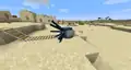 A squid riding a minecart.