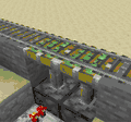 An example of sticky piston use with rails.