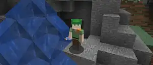 Alex holding a water bottle on a banner for Taking Inventory.