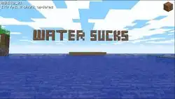 A "Water sucks" sign built of dirt.