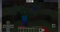 Zombies attacking in Bedrock Edition[18]