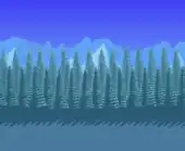 Evergreen forest blocking snowy mountains.